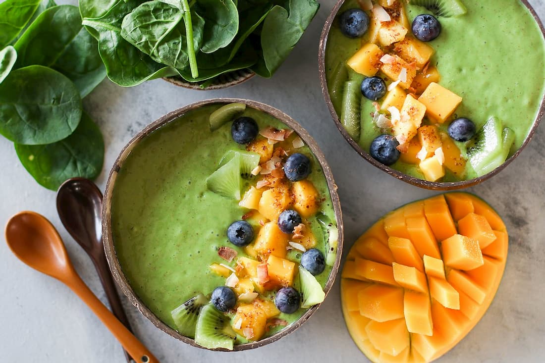 green smoothie in coconut bowl 